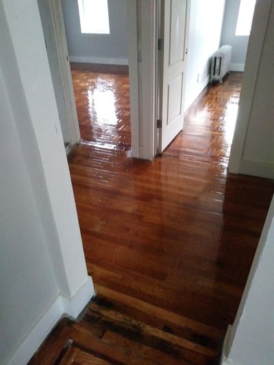 Refinished parquet floor in a hallway
