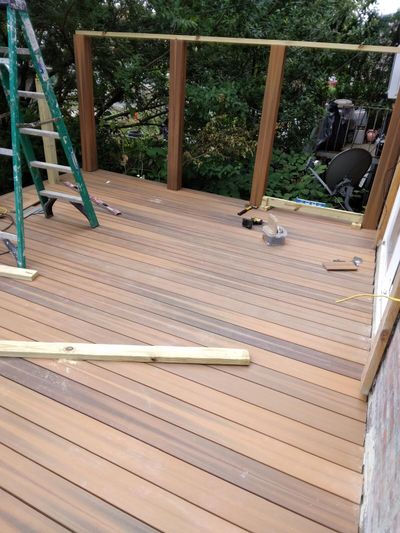 Composite deck boards with timber posts and framing in progress